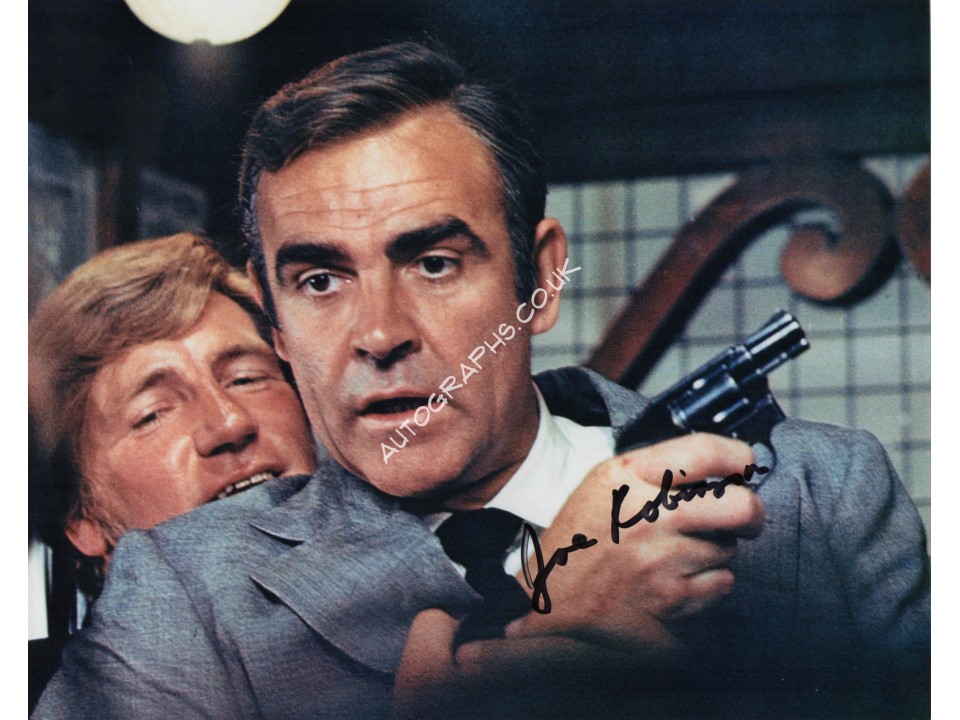 Joe Robinson James Bond genuine authentic autograph signed photo. COA UACC Joe Robinson James Bond genuine authentic autograph signed photo. COA UACC