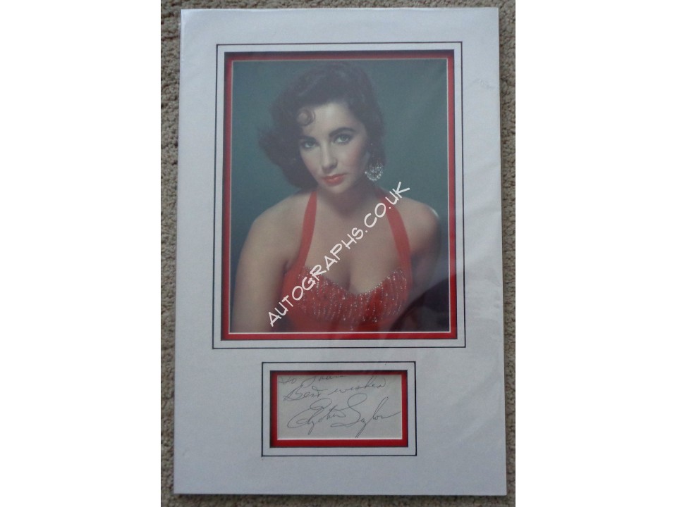 Elizabeth Taylor signed authentic genuine signature autograph display. COA UACC Elizabeth Taylor signed authentic genuine signature autograph display. COA UACC