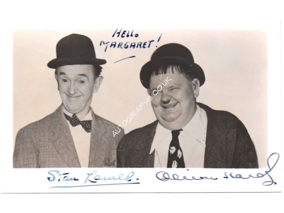 Stan Laurel and Oliver Hardy authentic signed genuine autograph vintage photo. COA UACC