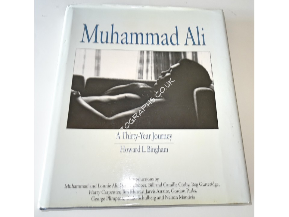 Muhammad Ali boxing signed authentic genuine signature book. COA UACC