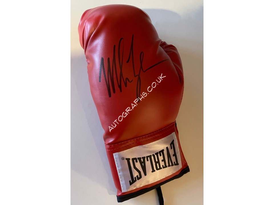 Mike Tyson boxing glove signed authentic genuine signature. COA UACC Mike Tyson boxing glove signed authentic genuine signature. COA UACC
