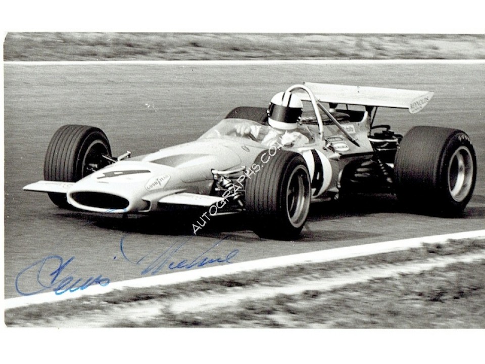 Denny Hulme signed authentic genuine signature photo. COA UACC