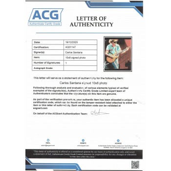 Carlos Santana genuine signed photograph. COA UACC