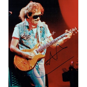 Carlos Santana genuine signed photograph. COA UACC