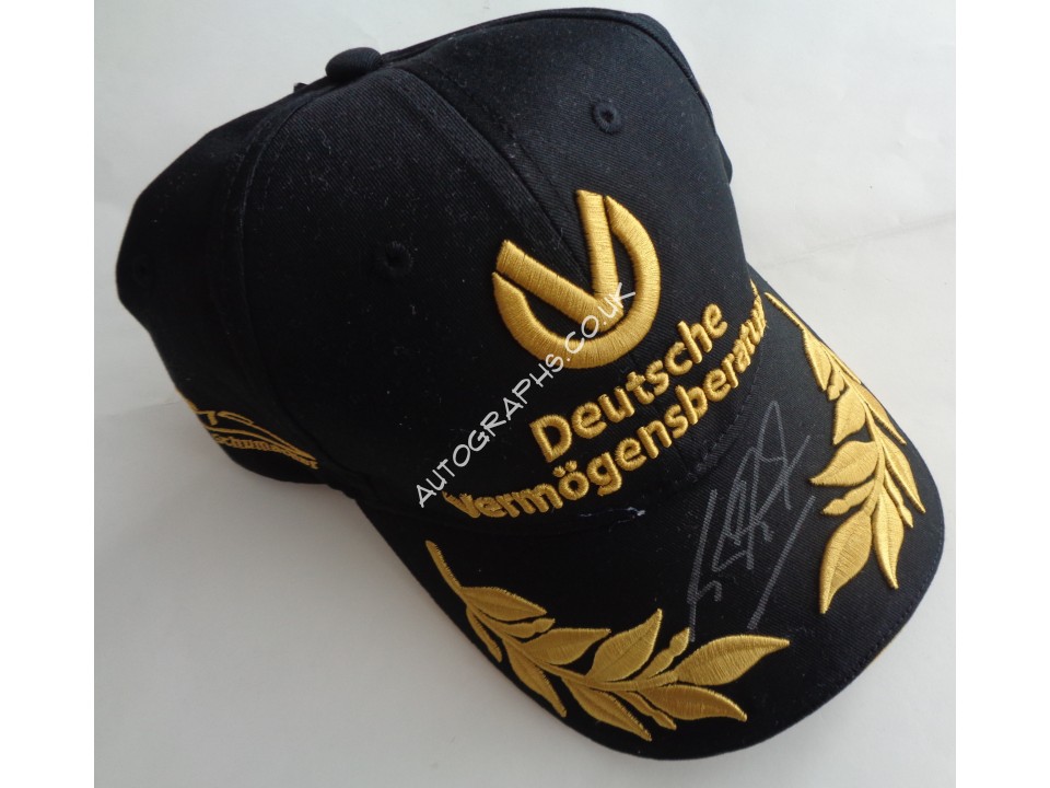 Michael Schumacher F1 Ferrari authentic genuine signed cap. COA UACC Michael Schumacher F1 Ferrari authentic genuine signed cap. COA UACC