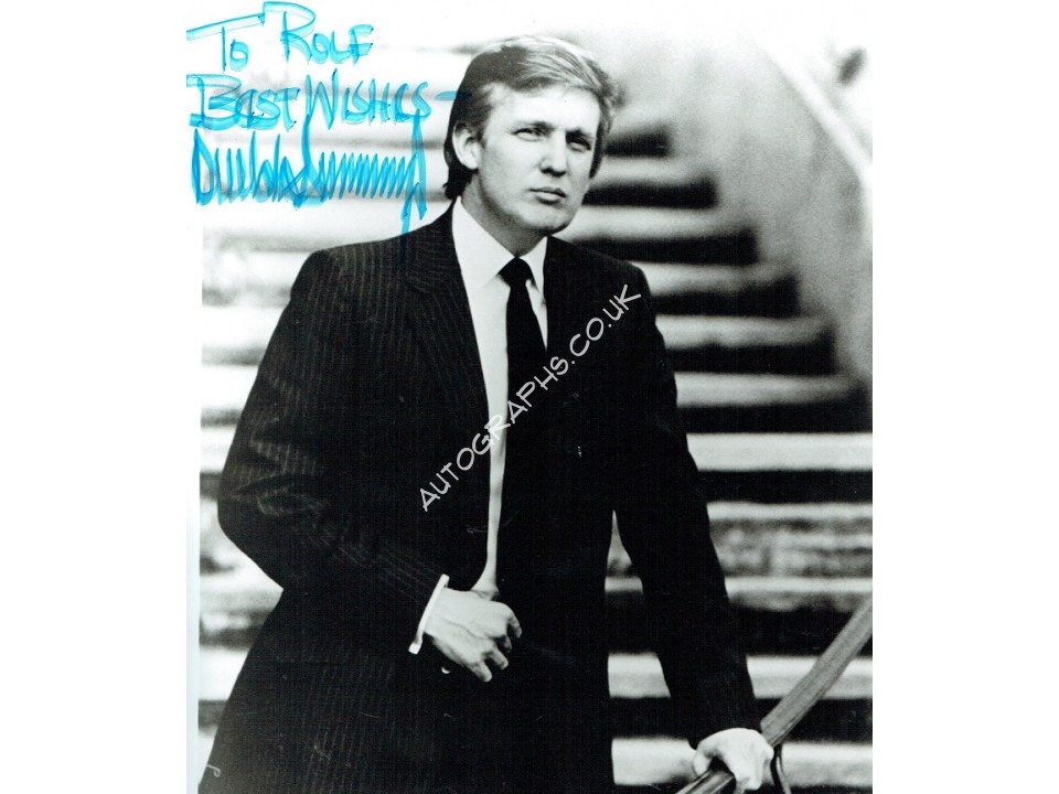 Donald Trump genuine signed photograph. COA UACC