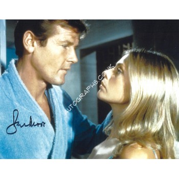 Roger Moore Signed 8x10 James Bond Photograph 007. COA UACC