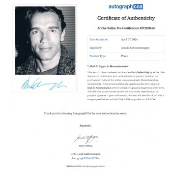 Arnold Schwarzenegger signed photograph. COA UACC