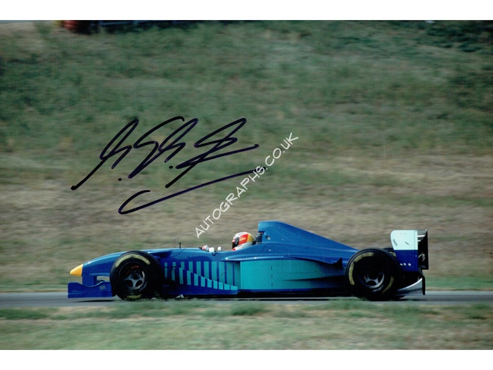 Michael Schumacher Signed Photograph. COA UACC Michael Schumacher Signed Photograph. COA UACC