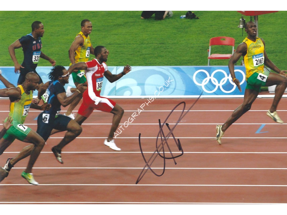 Usain Bolt Signed 12x8 Photograph. COA UACC
