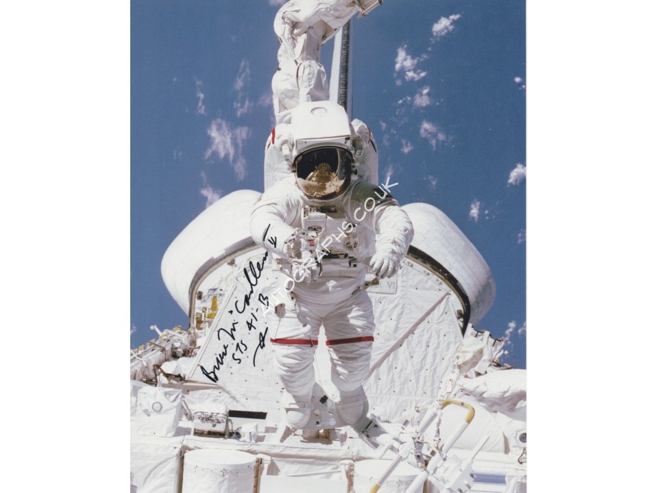 Bruce McCandless STS 41b authentic genuine signed photo. COA UACC